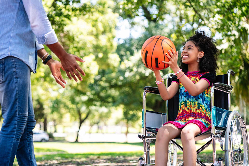 a child with physical disability in a wheel chair