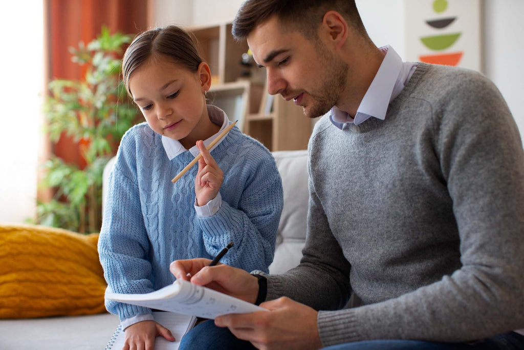 a father reviewing her daughters grades in school