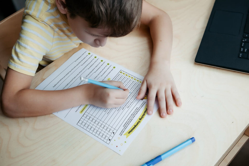 a kid answering a compassion worksheet