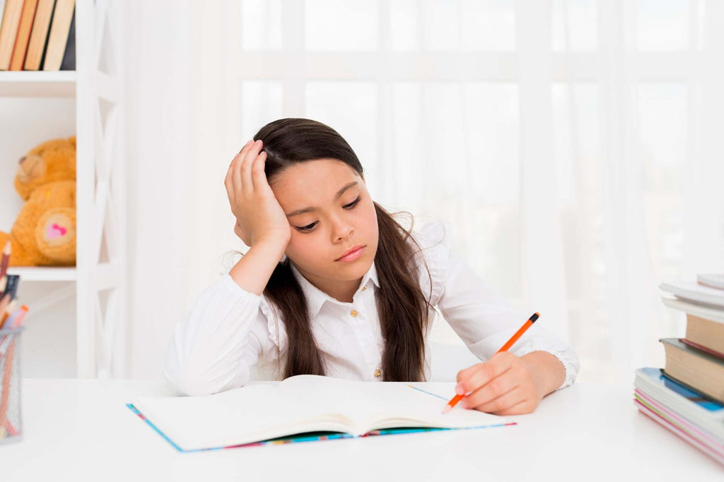 a perfectionist kid studying