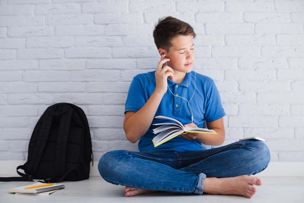 a teen taking a break after studying