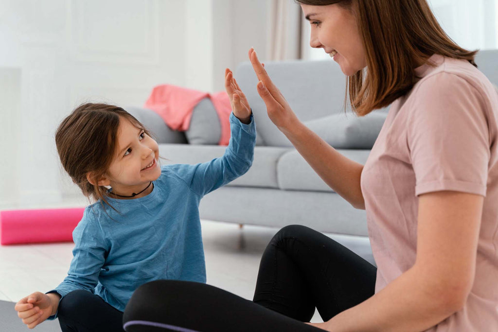 a woman teaching impulse control to a child