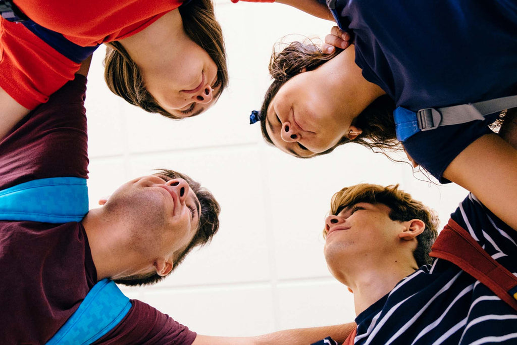 bottom view of four middle school kids
