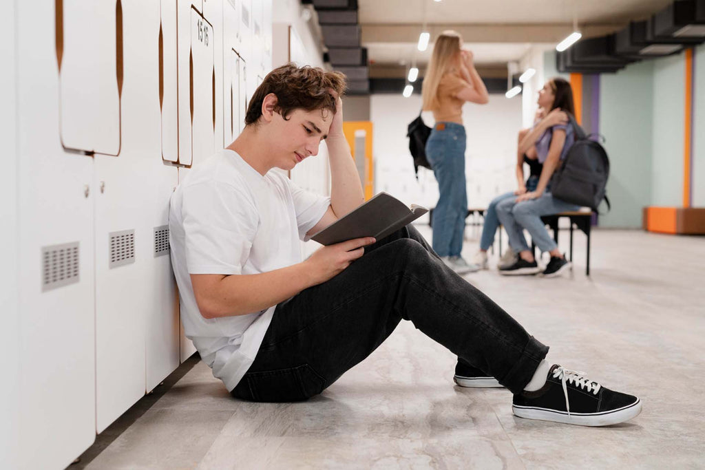 boy reading on floor