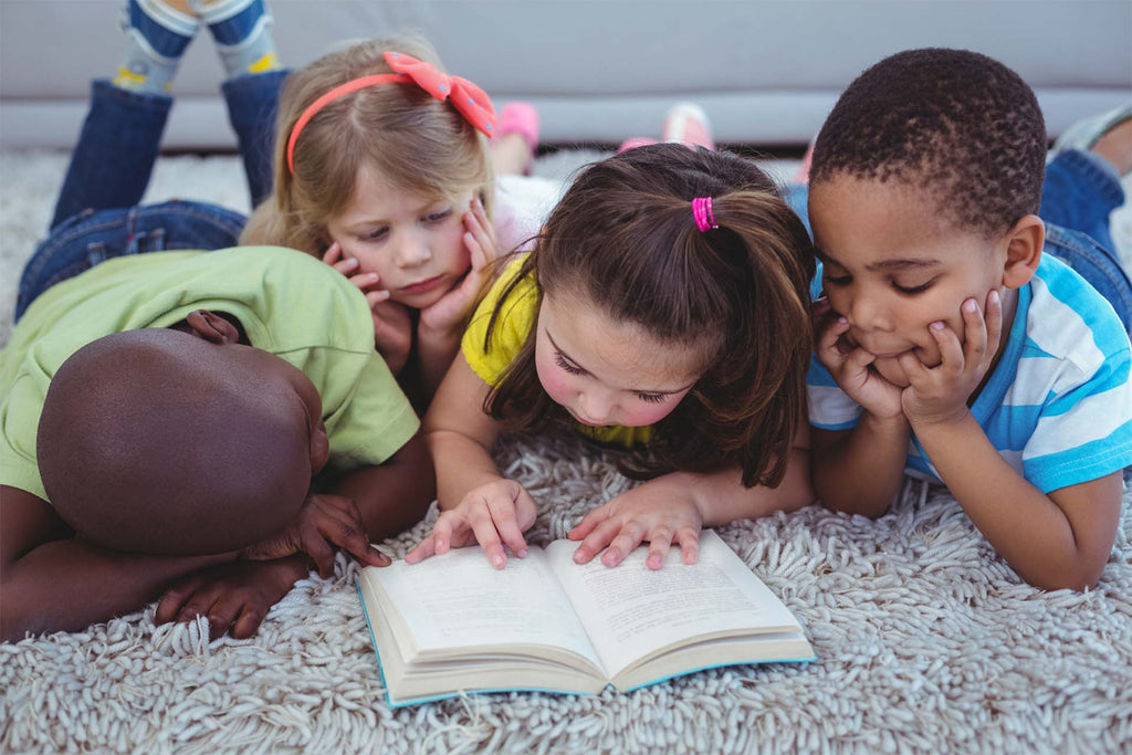 kids reading a book about diversity