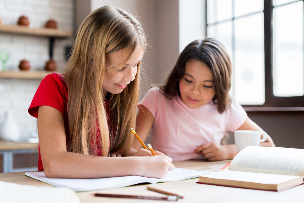 students helping each other with a homework