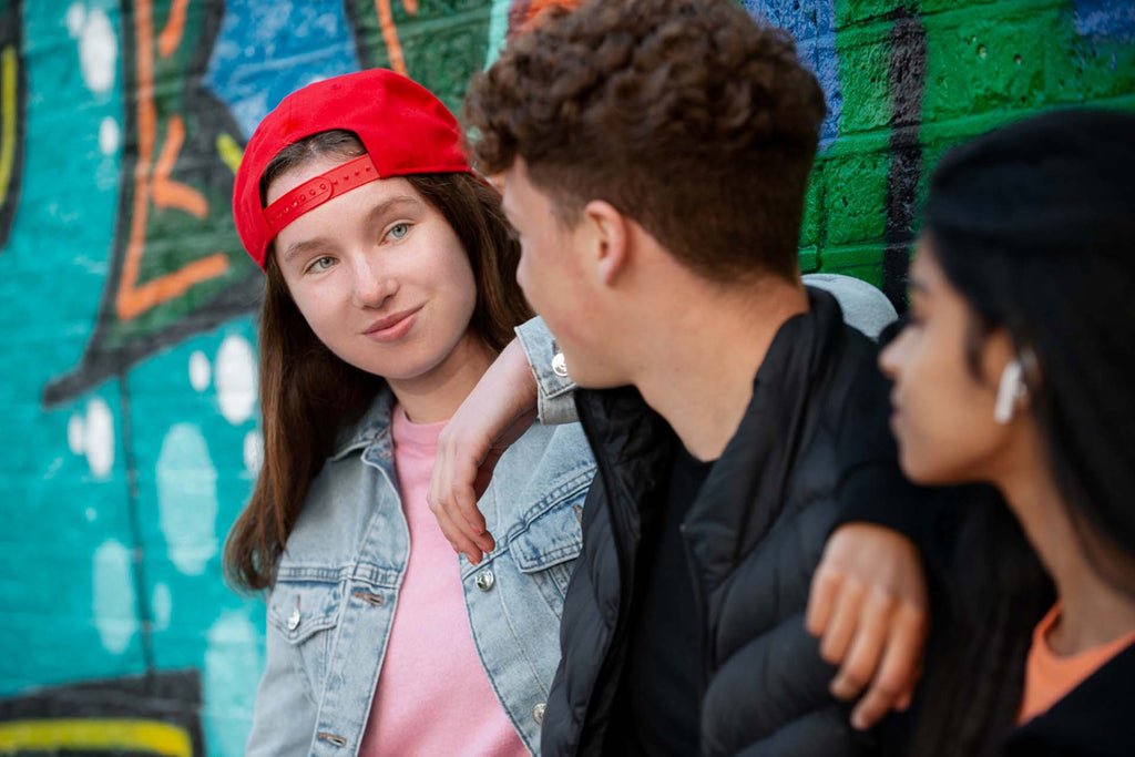 two teens forgiving each other after a conflict